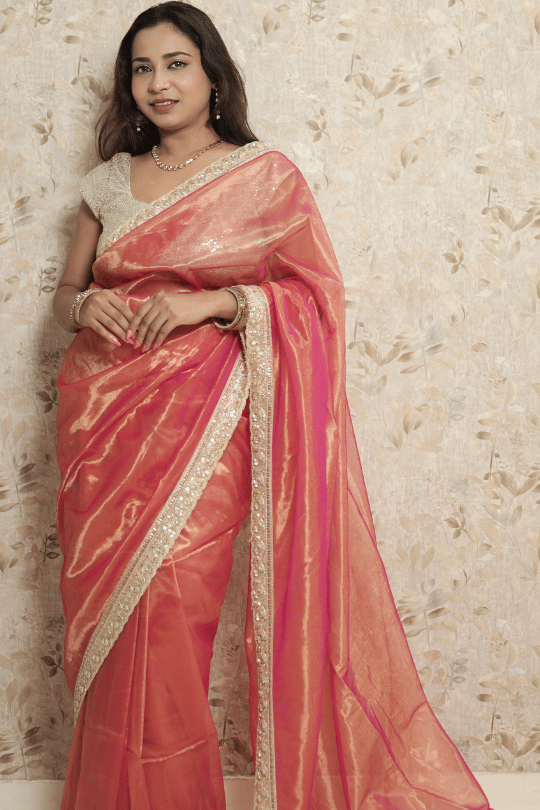 Peach Pink Soft Organza Saree with Golden Zari Sequin Work & Bottle Green Velvet Blouse