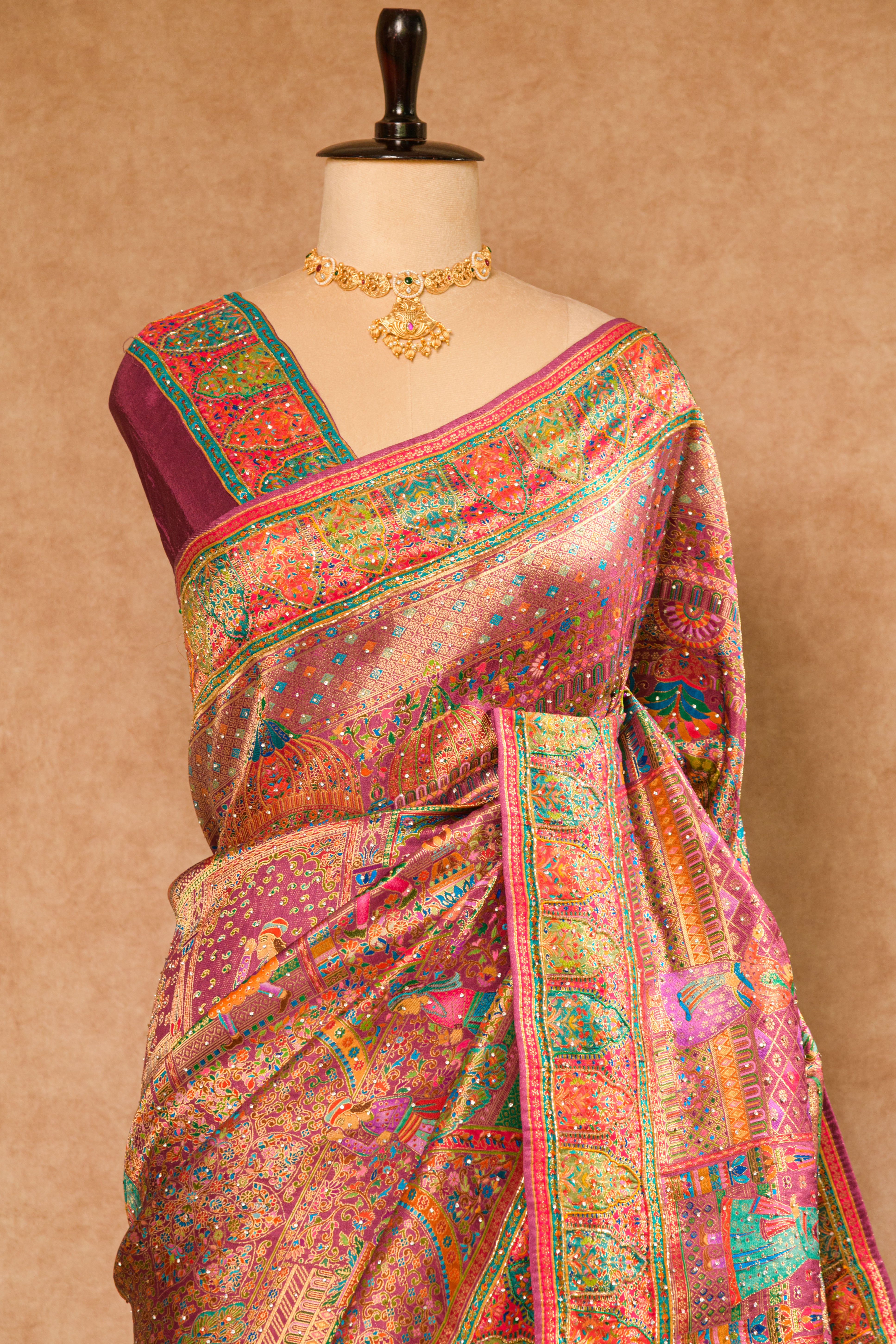 Wine Kanjivaram Tissue Silk Saree with Position Weaving & Cutdana Work