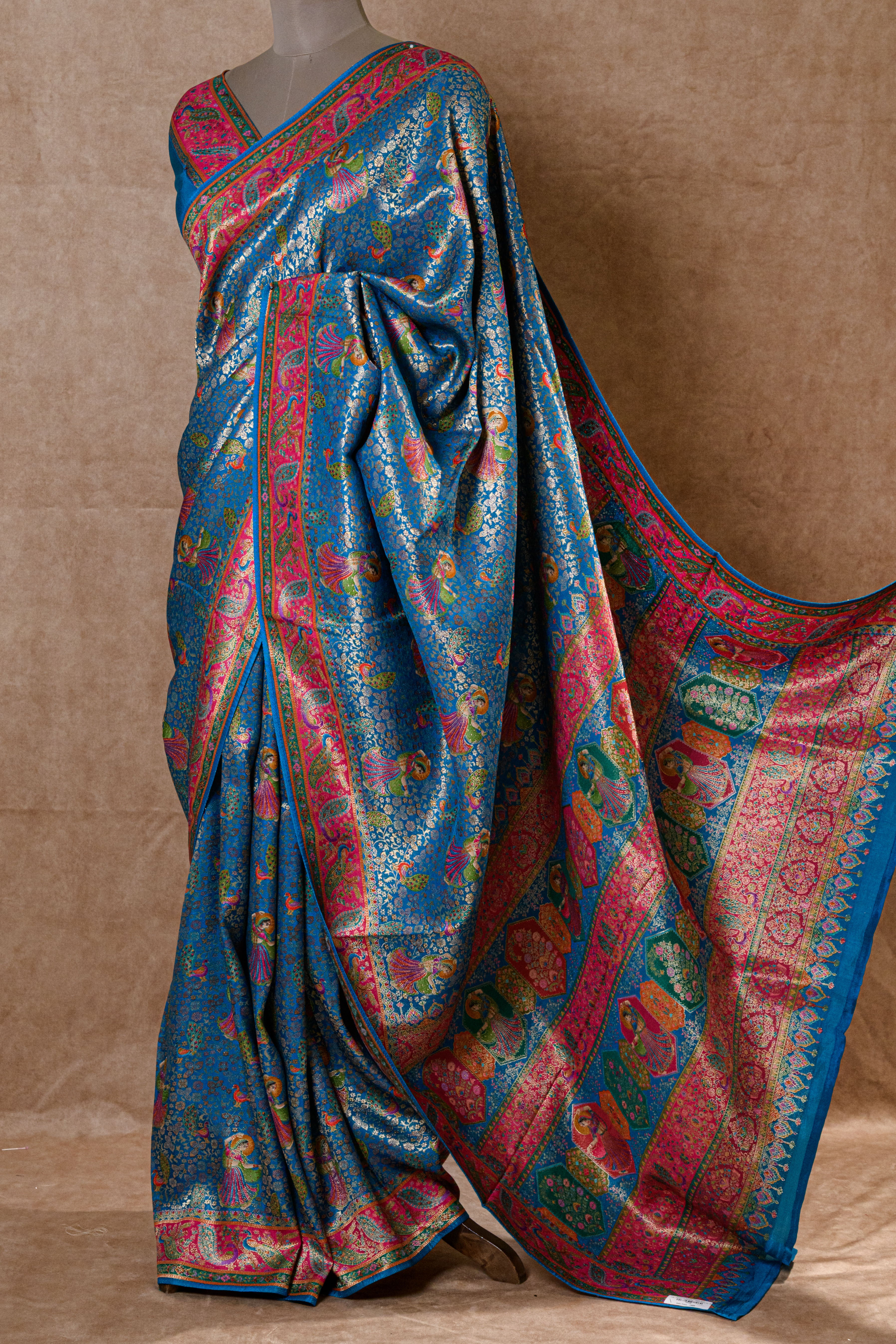 Turquoise Blue Kanjivaram Tissue Silk Saree with Golden and Rani Accents