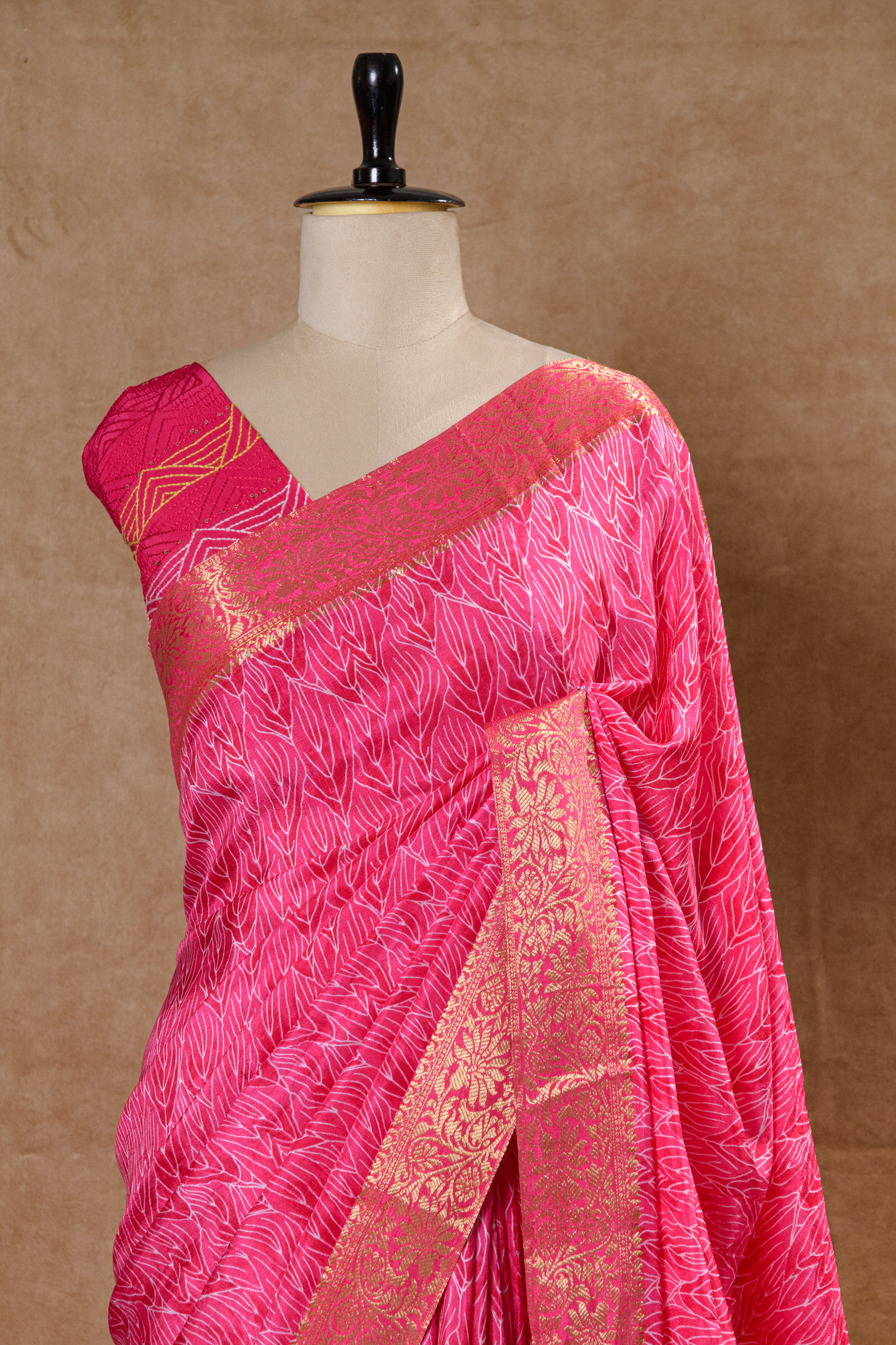 Rani Pink Crepe Silk Saree with Golden Zari Border and Embroidered Blouse