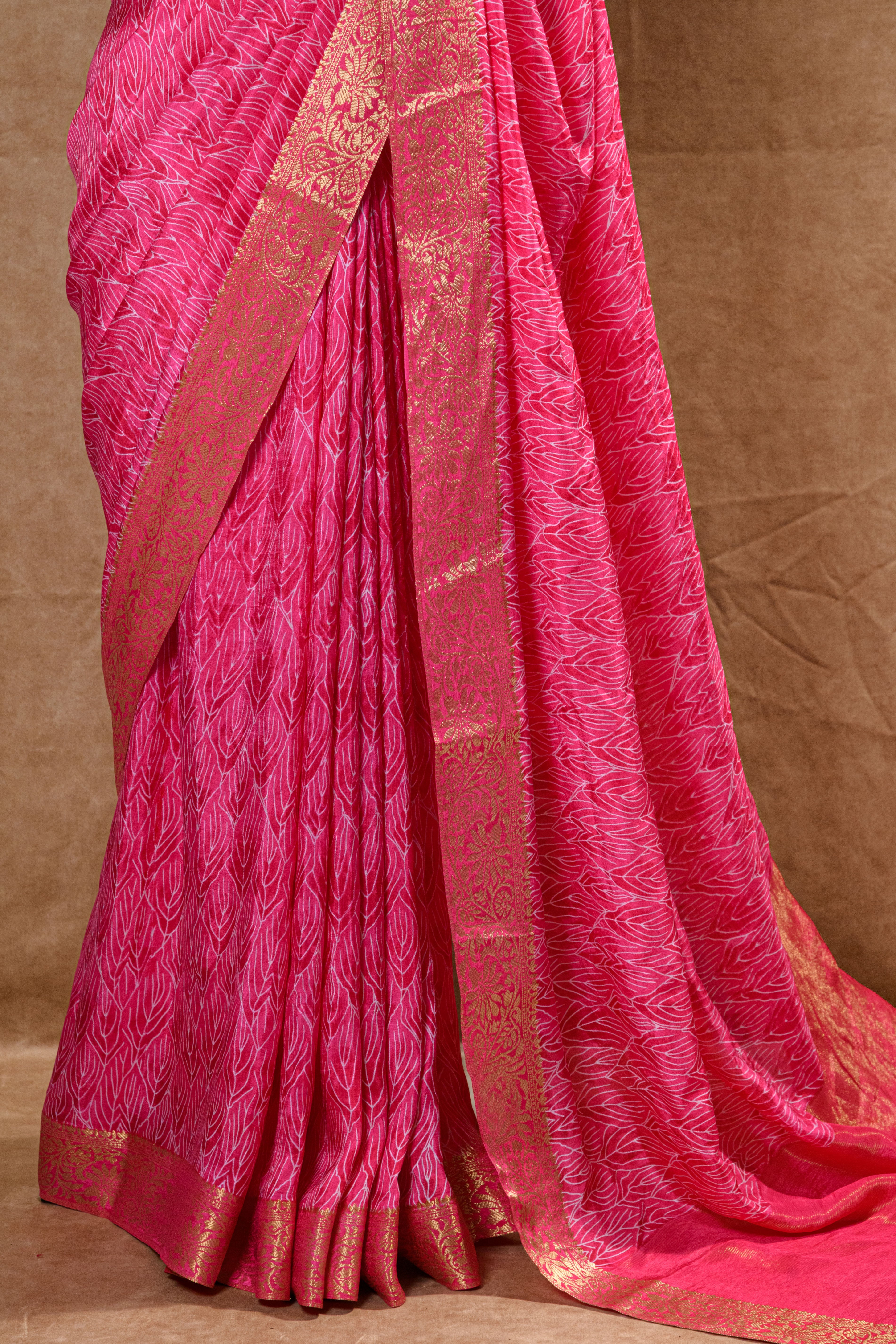 Rani Pink Crepe Silk Saree with Golden Zari Border and Embroidered Blouse