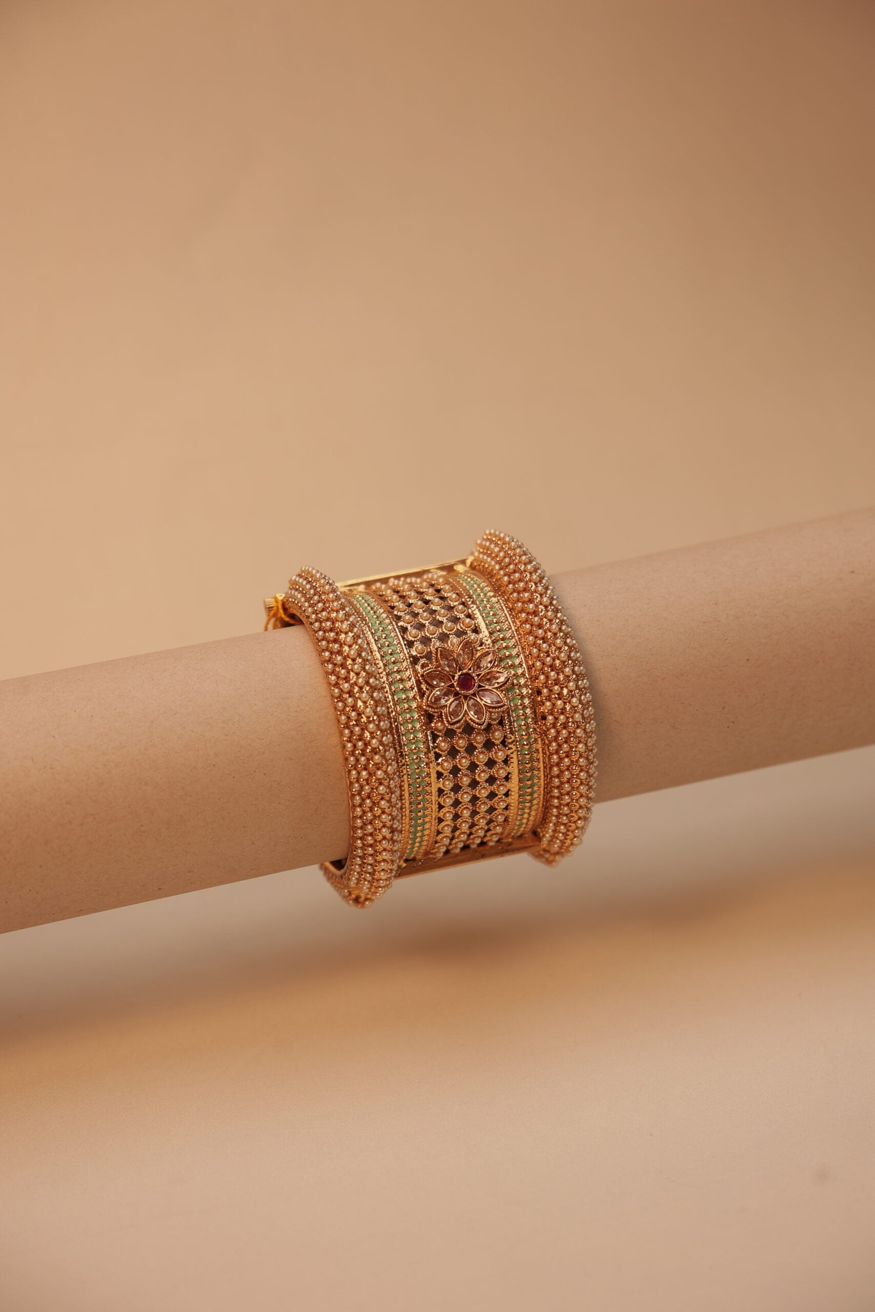 Golden Statement bangle with bead work