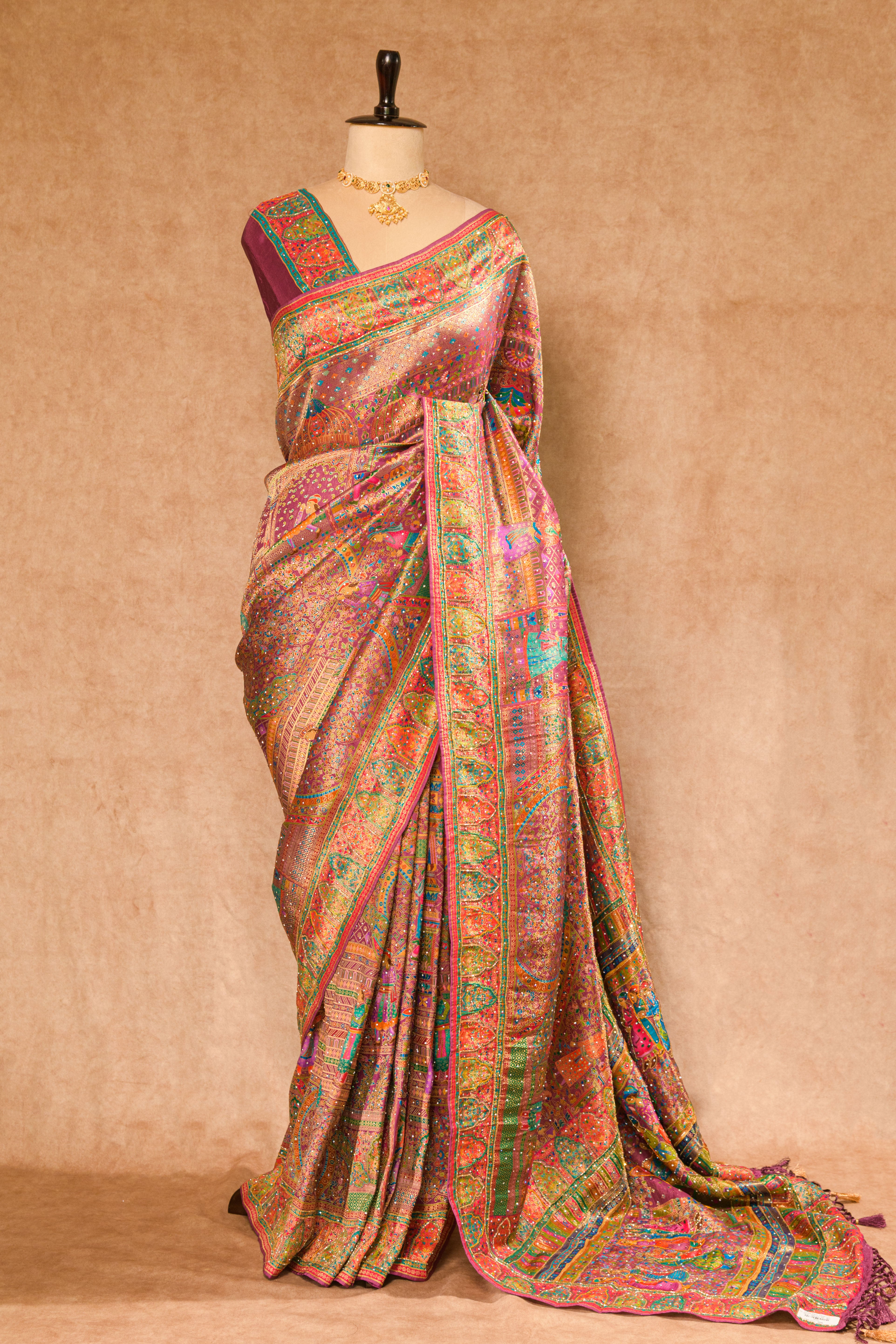 Wine Kanjivaram Tissue Silk Saree with Position Weaving & Cutdana Work