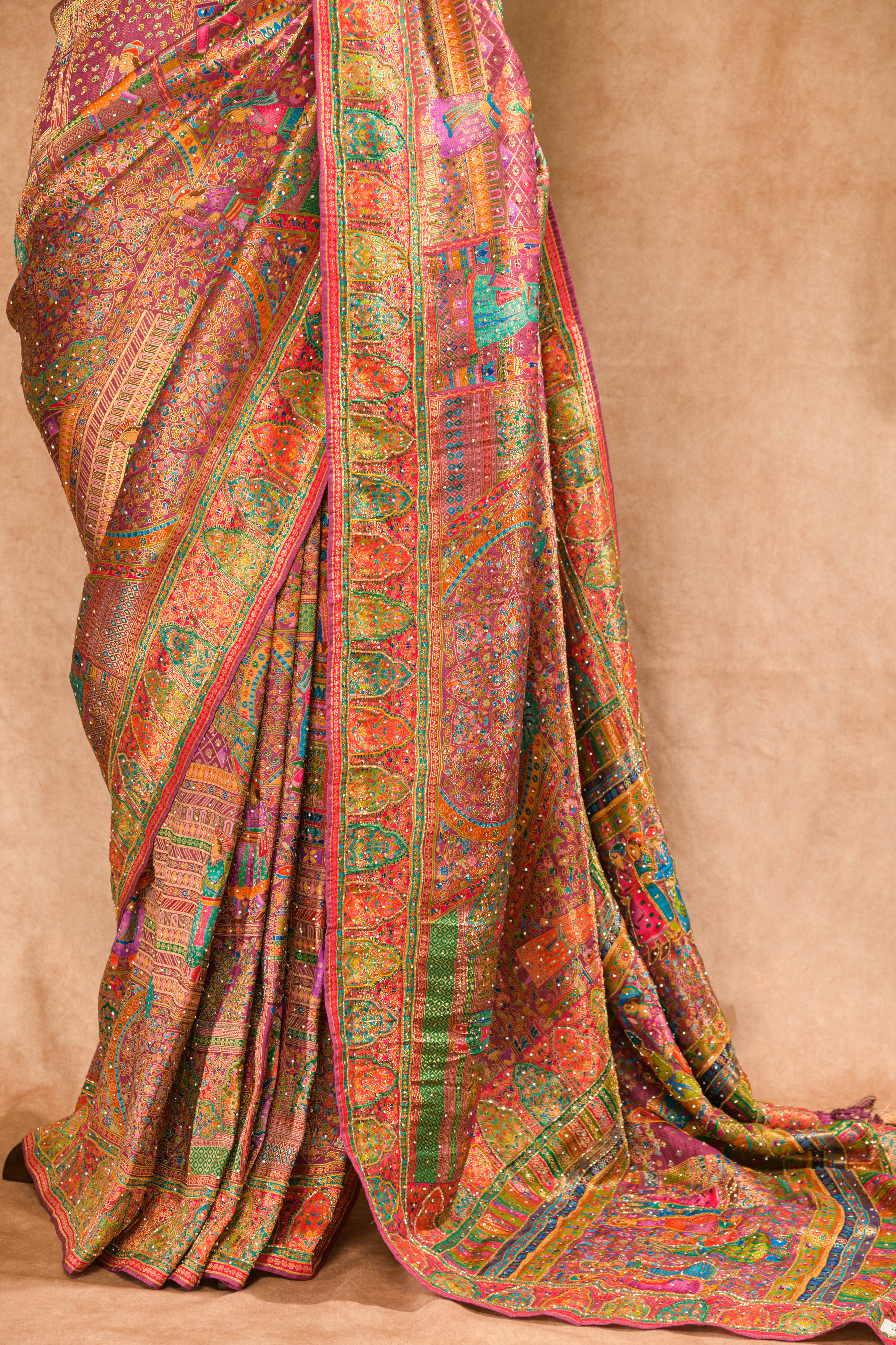 Wine Kanjivaram Tissue Silk Saree with Position Weaving & Cutdana Work
