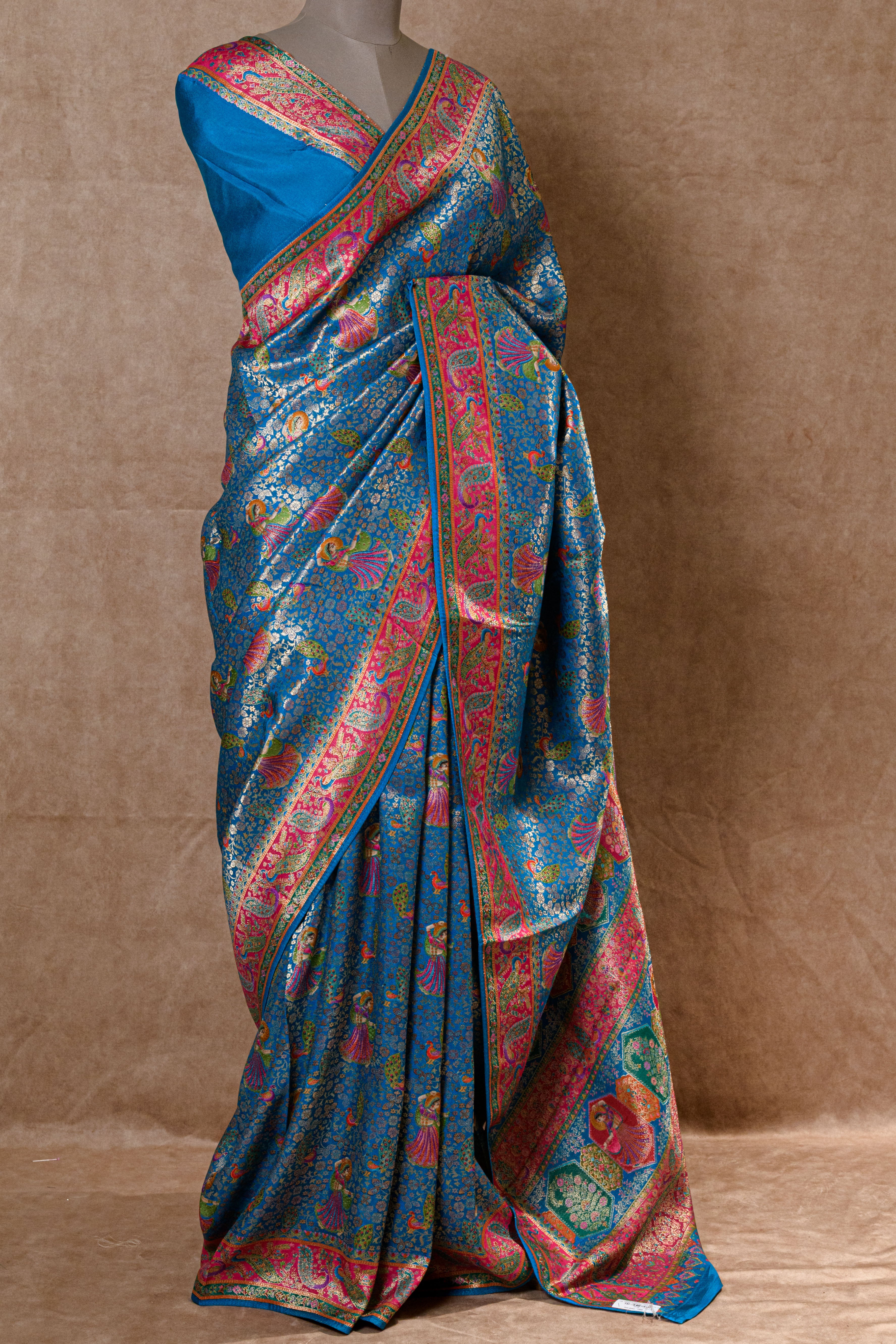 Turquoise Blue Kanjivaram Tissue Silk Saree with Golden and Rani Accents