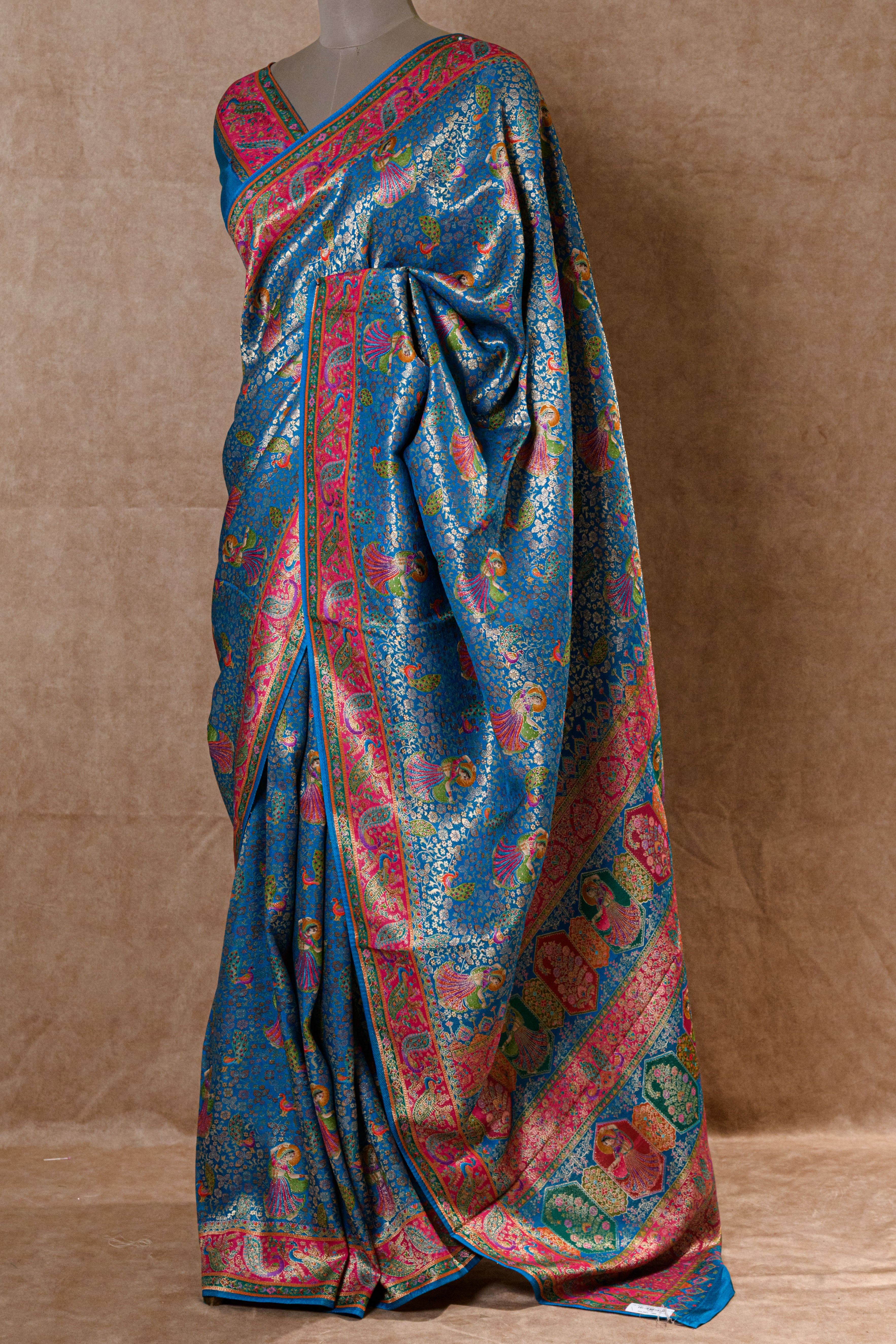 Turquoise Blue Kanjivaram Tissue Silk Saree with Golden and Rani Accents